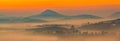 Beautiful morning panorama landscapes with the fog through the mountains