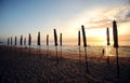 Beautiful morning sunrise with beach parasol Royalty Free Stock Photo