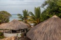 Beautiful morning view on the Indian ocean and the beach from balcony over the hut-tops Royalty Free Stock Photo