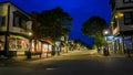 Beautiful morning view from Main Street in Bar Harbor without people and with lights on