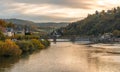 Beautiful morning view with warm colors on the riverbanks of the Neckar river. Beautiful historical city of Heidelberg in Germany. Royalty Free Stock Photo