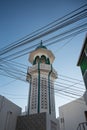 Beautiful mosque minaret covered by multiple wires