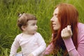 Beautiful mother and baby little girl outdoor Royalty Free Stock Photo