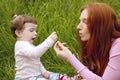 Beautiful mother and baby little girl outdoor Royalty Free Stock Photo