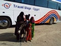 Beautiful mother Bedouin with two children with donkey on the way to Luxor, city in Egypt, Bedouin lifestyle