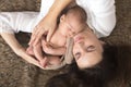 Beautiful mother embracing with tenderness and care her newborn Royalty Free Stock Photo