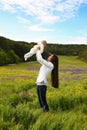 Beautiful mother having fun with her little cute baby in summer garden Royalty Free Stock Photo