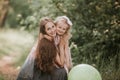Beautiful Mother And her little daughter outdoors. Nature. Outdoor Portrait of happy family. Happy Mother`s Day Joy Royalty Free Stock Photo