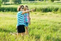 Beautiful mother outdoors with happy daughter child.