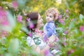 Beautiful mother playing with her one year old daughter on Royalty Free Stock Photo