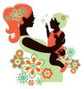 Beautiful mother silhouette with baby