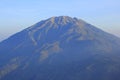 The beautiful Mount Merbabu turns bluish in the bright morning sun
