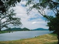 Beautiful mountain, blue sky and water viewpoint of Bang Pra Reservoir, Thailand. It`s one of famous tourist attraction and great Royalty Free Stock Photo