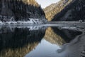 Beautiful mountain lake of artouste in sunrise dawn reflecting mountains, pyrenees, france