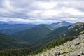 Amazing forest and huge stones on top of the hillside near the peak of mountain. Carpathians, Ukraine Royalty Free Stock Photo