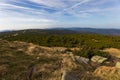 Beautiful mountain landscape with blue cloudy sky, yellow straw and bushes at sunny day Royalty Free Stock Photo