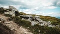 Beautiful mountain landscape of Carpathians, green mountains and rocks on background of clouds Royalty Free Stock Photo