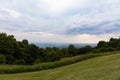 Beautiful mountain landscape, cloudy and overcast scene of the Blue Ridge Mountains of North Carolina, rolling hills of mown grass Royalty Free Stock Photo