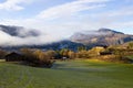 Beautiful mountain landscape covered with fog in autumn, path to the village,norwegian valley, Norway Buskerud Hemsedal