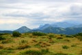 Beautiful mountain landscape with fog in the dark sky in front of the storm Royalty Free Stock Photo