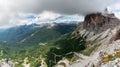 Beautiful mountain landscape panorama with two climbers and a spectacular view of the Dolomites