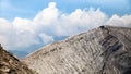 Beautiful mountain landscape. Part of the crater of the Bromo volcano. View from the top of the mountain. Blue sky and Royalty Free Stock Photo