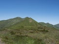 Beautiful mountain landscape of Western Tatra mountains or Rohace with hiking trail on ridge. Sharp green grassy rocky