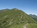 Beautiful mountain landscape of Western Tatra mountains or Rohace with hiking trail on ridge. Sharp green grassy rocky