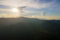 Beautiful mountain panoramic landscape with hazy peaks and foggy valley at sunset Royalty Free Stock Photo