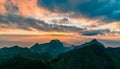 Beautiful mountain peaks topped with sky, cloud and blast horizon sun Royalty Free Stock Photo