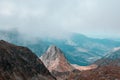 Beautiful mountain range covered with fog