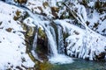 Beautiful mountain river waterfall in winter Royalty Free Stock Photo