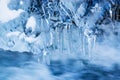 Beautiful mountain river in winter  with icicles Royalty Free Stock Photo