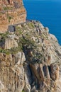 Beautiful mountain road, cliffs and ocean Royalty Free Stock Photo