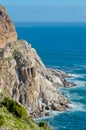 Beautiful mountain road, cliffs and ocean Royalty Free Stock Photo