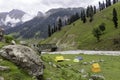 Beautiful mountain scenery. River, valley, snow, blue sky, white clouds. In-depth trip on the Sonamarg Hill Trek in Jammu and Royalty Free Stock Photo