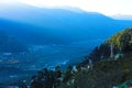 Beautiful mountain valley view with green trees