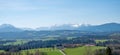 Beautiful mountain view from Irschenberg, historic church Wilparting. blue sky at the upper half Royalty Free Stock Photo