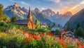 Beautiful mountain village with wooden church and flower garden in summer Royalty Free Stock Photo