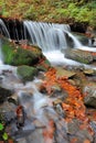 Mountain waterfall in autumn forest Royalty Free Stock Photo