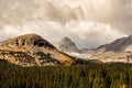 Beautiful mountainous landscape with autumn colors under a breathtaking cloudy sky Royalty Free Stock Photo