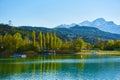 Beautiful Mountains and a lake in autumn. Baggersee Badesee Rossau, Innsbruck, Austria