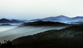 Beautiful mountains landscape from the top of the hill with fog Royalty Free Stock Photo