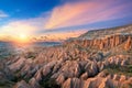 Beautiful mountains and Red valley at sunset in Goreme, Cappadocia in Turkey. Royalty Free Stock Photo