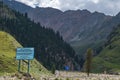 Beautiful mountains with rocky terrain and sky background. Barskoon river gorge. Road to Kumtor gold mine. Natural background