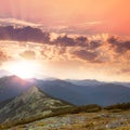 Beautiful Mountains - sunset time. Hight peaks, clouds and red Royalty Free Stock Photo