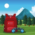 Beautiful mountains and trees landscape with backpack and binoculars