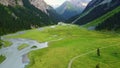 Beautiful mountains with a winding river flowing in the mountains of Kyrgyzstan