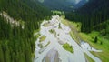 Beautiful mountains with a winding river flowing in the mountains of Kyrgyzstan