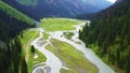 Beautiful mountains with a winding river flowing in the mountains of Kyrgyzstan